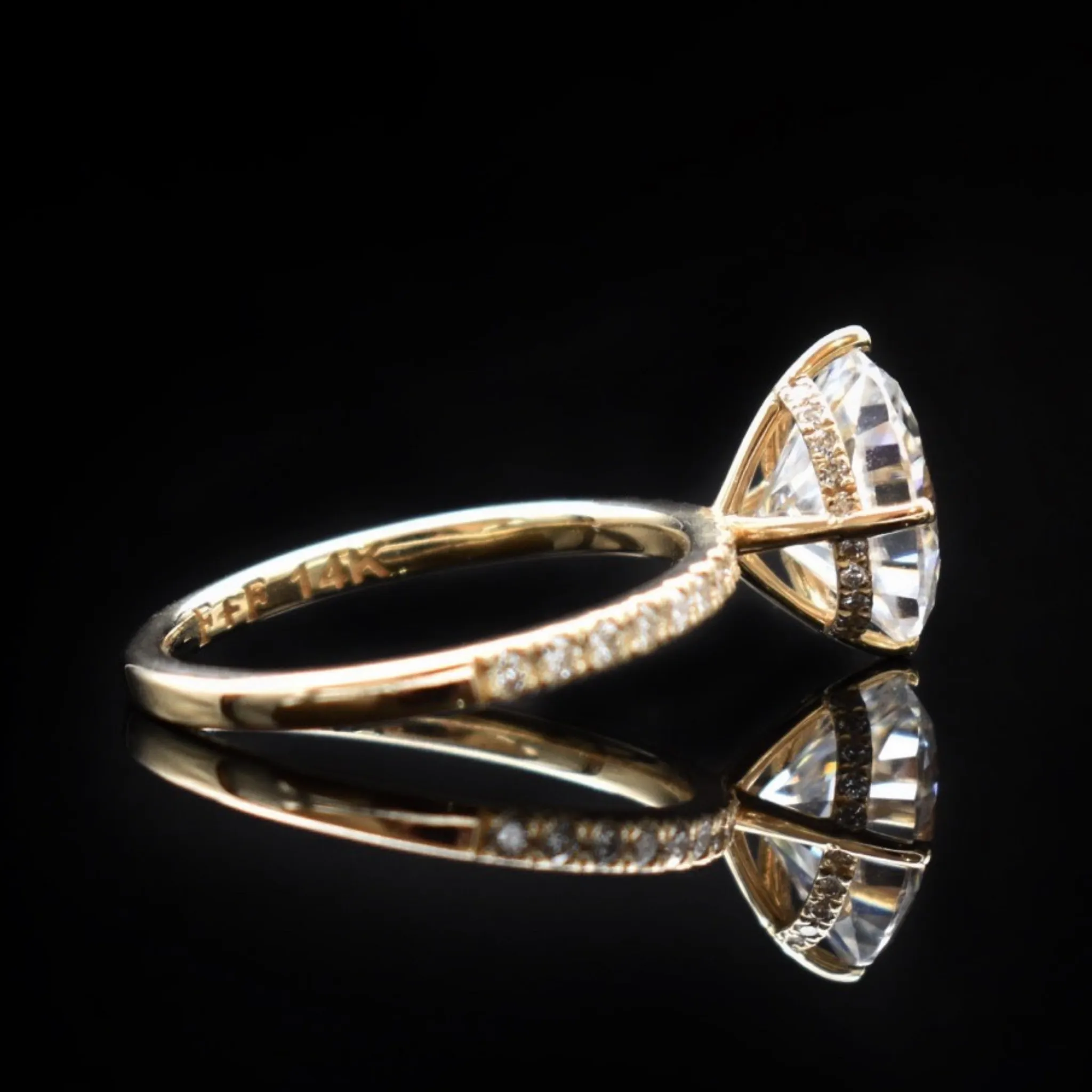 Diamond Oval Solitaire Engagement Ring With Hidden Halo